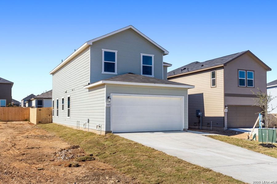 Front exterior of a new home in Southton Cove, Elmendorf, TX, highlighting curb appeal (Image 20).