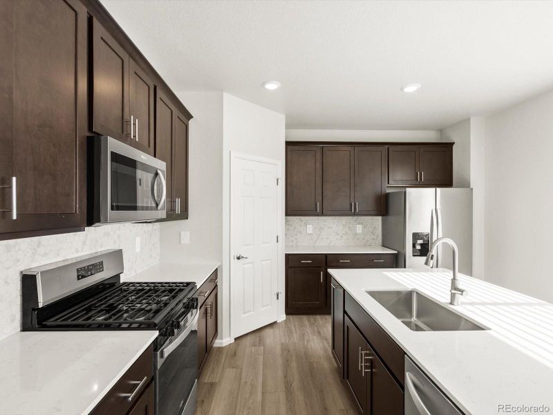 Furnished interior view inside a new home in Poudre Heights: The Lakes Collection, Windsor (Image 11).