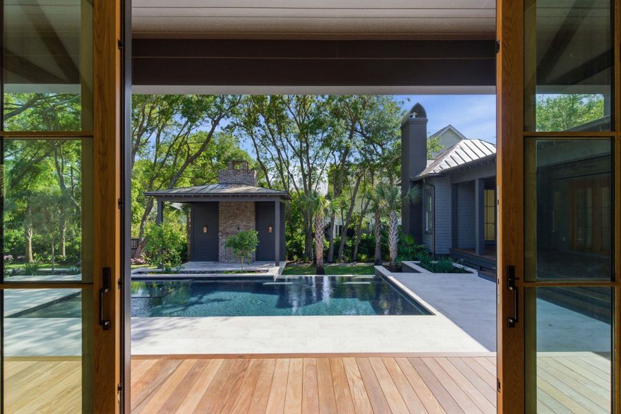 Exterior details and patio area of a home in , Sullivan's Island (Image 18).