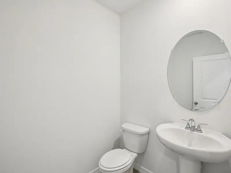 Furnished interior view inside a new home in The Grove at Stuart Crossing - Classic Series, Bartow (Image 4).