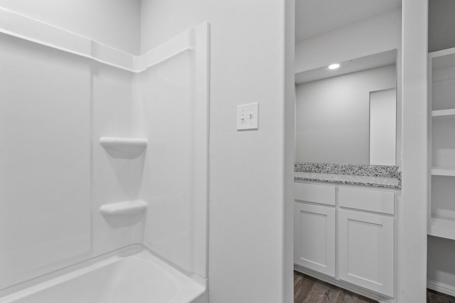 Representative furnished interior of a home built from the TAYLOR by D.R. Horton in Faculty Row, Abilene (Image 32).