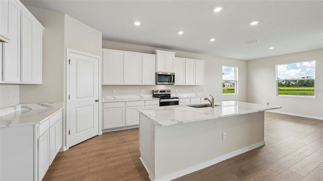 Furnished interior view inside a new home in Oakfield Trails, Parrish (Image 6).