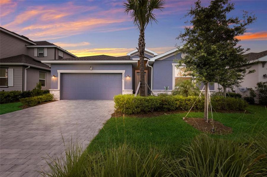 Front exterior of a new home in Rye Ranch, Parrish, FL, highlighting curb appeal (Image 21).