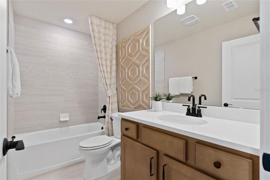 Furnished interior view inside a new home in Parkside Trails, Clermont (Image 10).