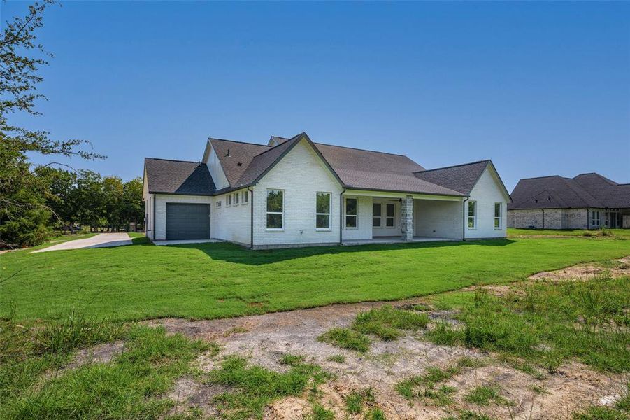Front exterior of a new home in , Farmersville, TX, highlighting curb appeal (Image 25).