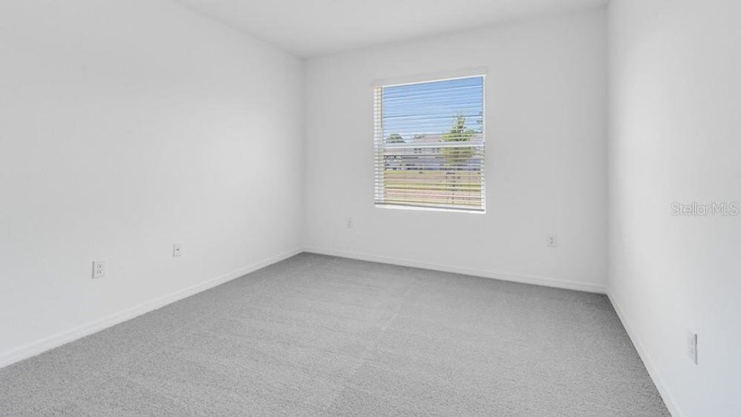 Spacious, unfurnished interior of a new home in Aden South at Westview, Kissimmee (Image 17).
