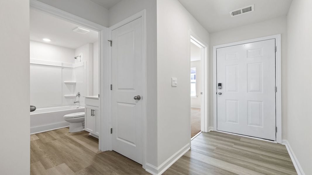 Spacious, unfurnished interior of a new home in Village Grove, Greenville (Image 17).