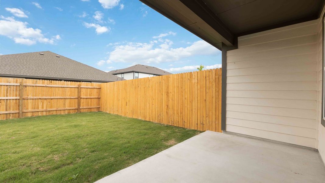 Exterior details and patio area of a home in Palomino, Manor (Image 3).