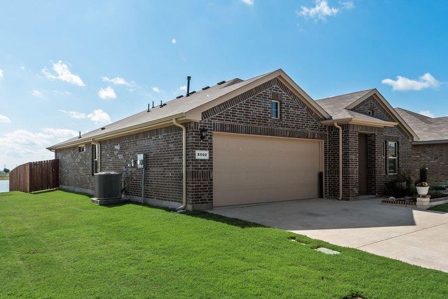 Front exterior of a new home in , Fort Worth, TX, highlighting curb appeal (Image 23).