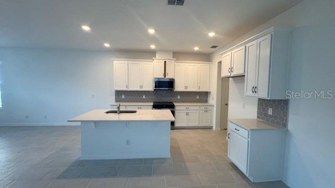 Furnished interior view inside a new home in Cypress Bluff, Groveland (Image 8).
