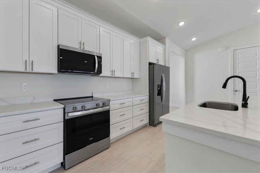 Furnished interior view inside a new home in Cape Coral, Cape Coral (Image 9).