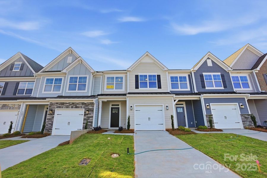 Front exterior of a new home in , Waxhaw, NC, highlighting curb appeal (Image 2). Front exterior of a new home in , Waxhaw, NC, highlighting curb appeal (Image 2).