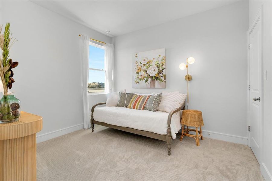 Bedroom featuring carpet flooring