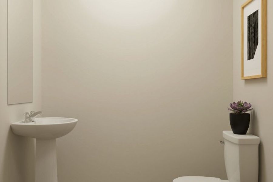 A bathroom with a sink and toilet. A bathroom with a sink and toilet.