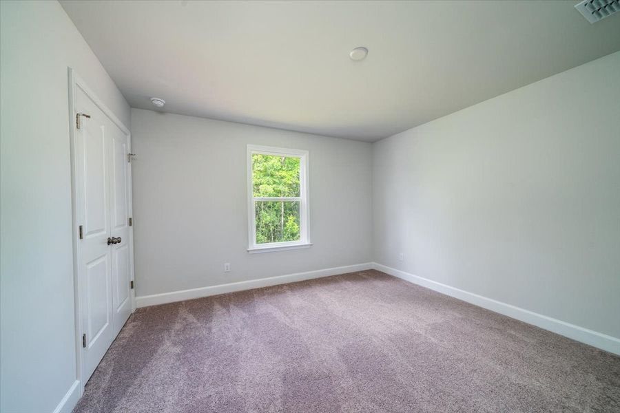 The secondary guest bedroom offers plenty of space to relax. The secondary guest bedroom offers plenty of space to relax.