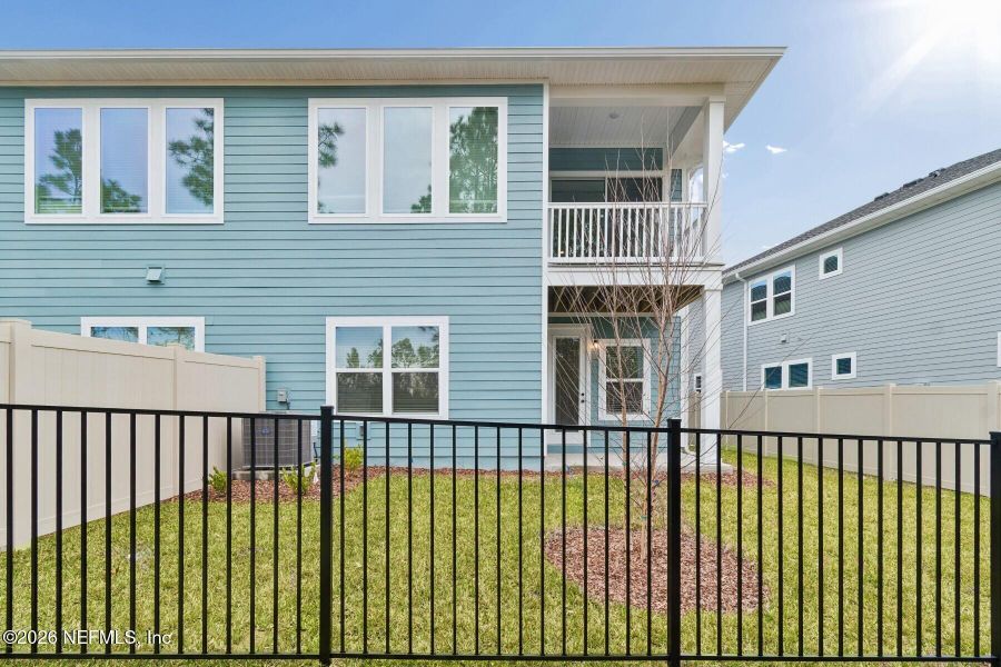 Exterior details and patio area of a home in Kettering at eTown - Paired Villas, Jacksonville (Image 3). Exterior details and patio area of a home in Kettering at eTown - Paired Villas, Jacksonville (Image 3).