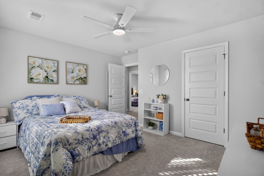 Furnished interior view inside a new home in Lindera Preserve at Cane Bay Plantation, Summerville (Image 38).