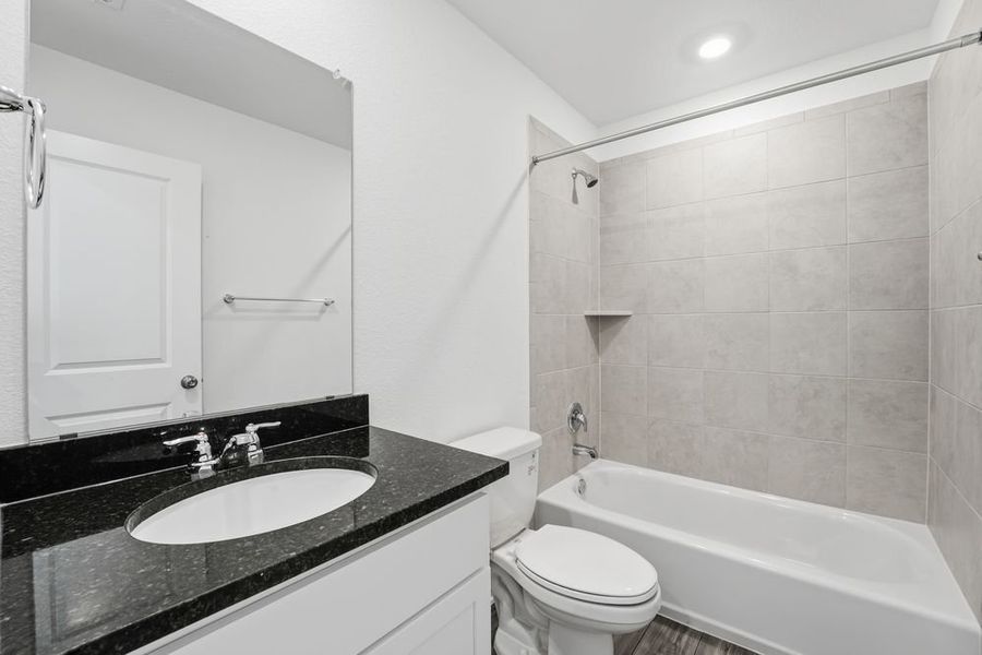 Furnished interior view inside a new home in Longview, Del Valle (Image 14).