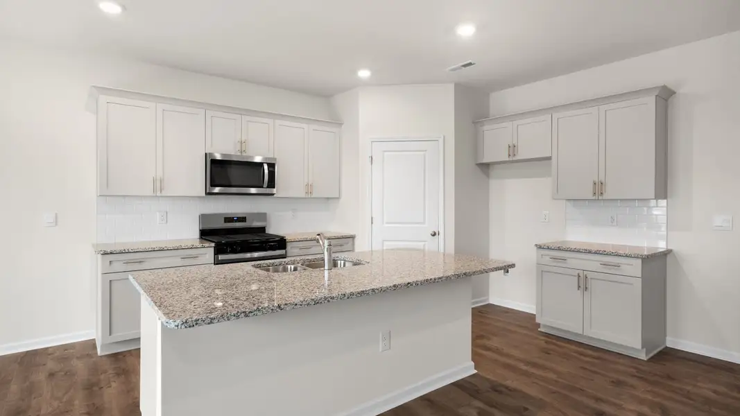 Furnished interior view inside a new home in The Reserve at Prestleigh, Wake Forest (Image 5).