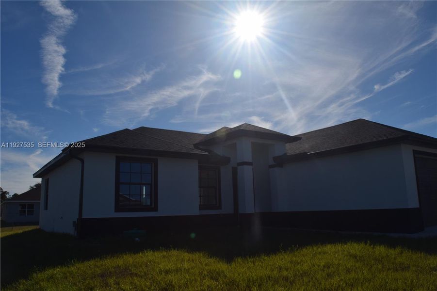 Exterior details and patio area of a home in , Lehigh Acres (Image 4). Exterior details and patio area of a home in , Lehigh Acres (Image 4).