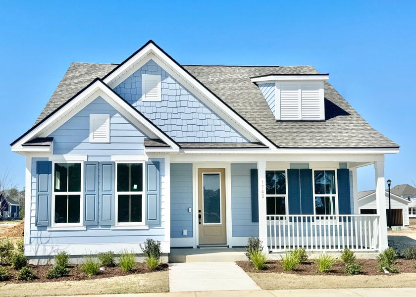 Front exterior of a new home in SayeBrook, Myrtle Beach, SC, highlighting curb appeal (Image 23).
