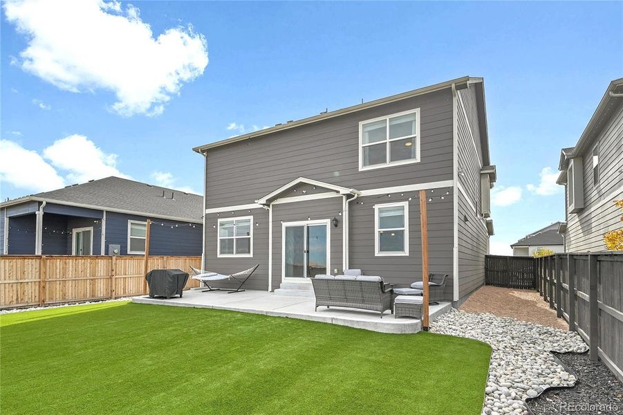Exterior details and patio area of a home in Settlers Crossing, Commerce City (Image 3).