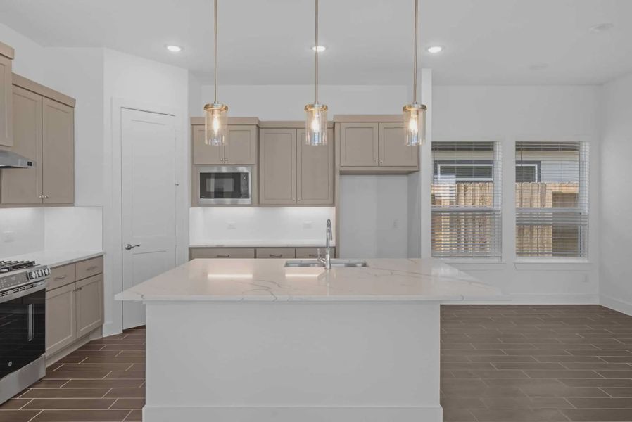 Representative furnished interior of a home built from the St Andrews by Chesmar Homes in Riceland Alley Loads, Mont Belvieu (Image 7).