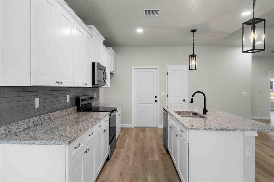 Furnished interior view inside a new home in , Alachua (Image 3).