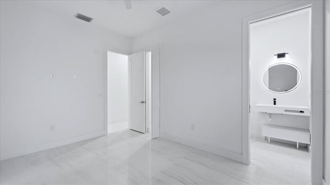 Spacious, unfurnished interior of a new home in , Port Charlotte (Image 36).