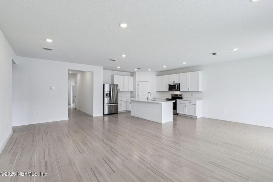 Spacious, unfurnished interior of a new home in Flagler Village - Signature Series, Palm Coast (Image 29).
