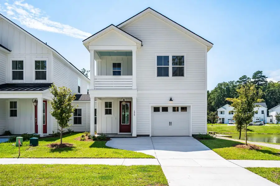 Front exterior of a new home in , Charleston, SC, highlighting curb appeal (Image 31). Front exterior of a new home in , Charleston, SC, highlighting curb appeal (Image 31).