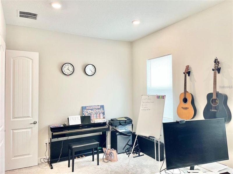 Furnished interior view inside a new home in Parkview Reserve, Orlando (Image 40).