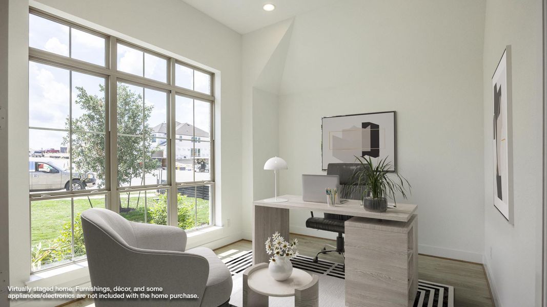 Office featuring wood finished floors and baseboards