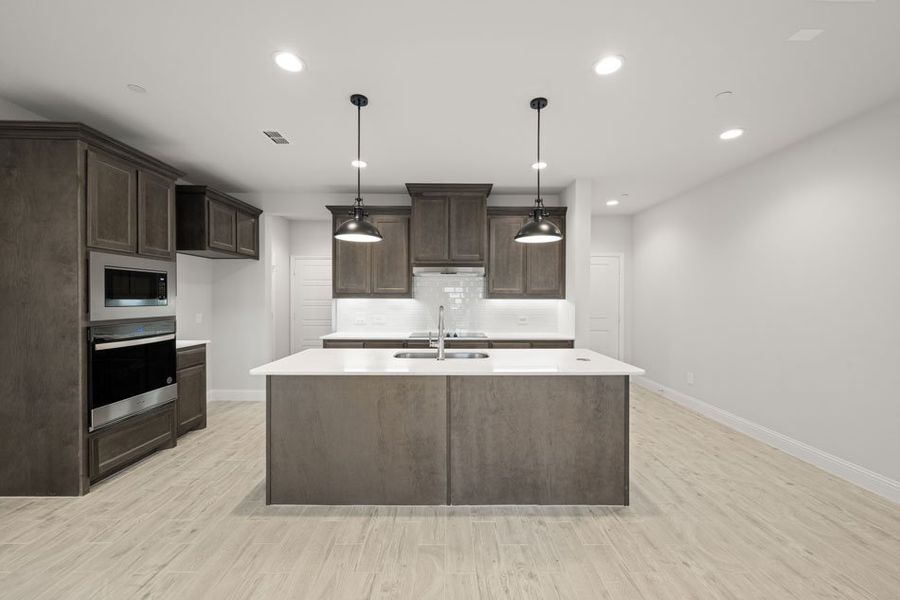 Representative exterior photo of a completed home built from the Bridgeport by Impression Homes in Main Street Village, Mansfield, TX (Image 3). Representative exterior photo of a completed home built from the Bridgeport by Impression Homes in Main Street Village, Mansfield, TX (Image 3).