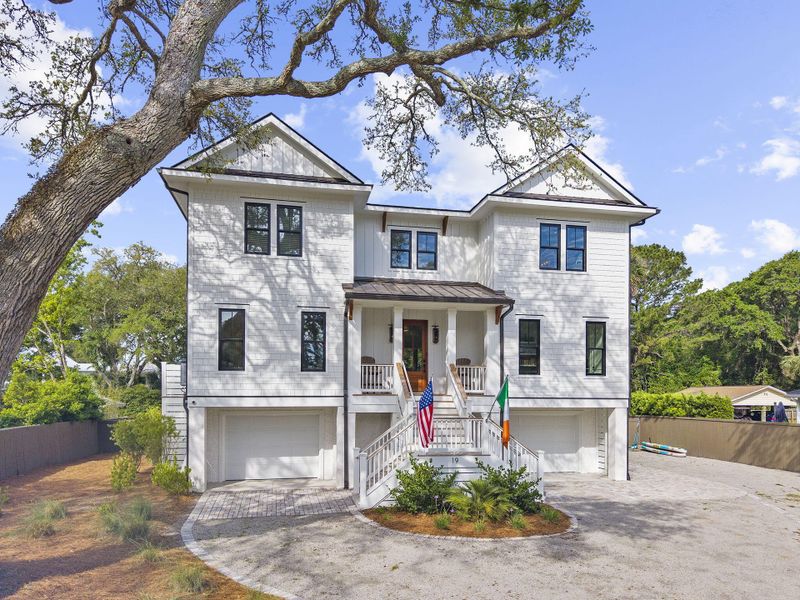 Front exterior of a new home in , Isle Of Palms, SC, highlighting curb appeal (Image 28). Front exterior of a new home in , Isle Of Palms, SC, highlighting curb appeal (Image 28).