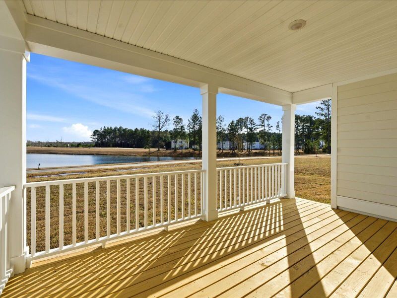 Exterior details and patio area of a home in The Coves at Lakes of Cane Bay II, Summerville (Image 4).