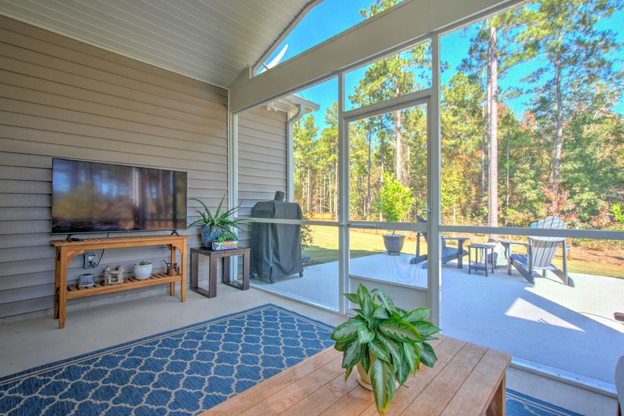 Exterior details and patio area of a home in French Quarter Creek, Huger (Image 29).
