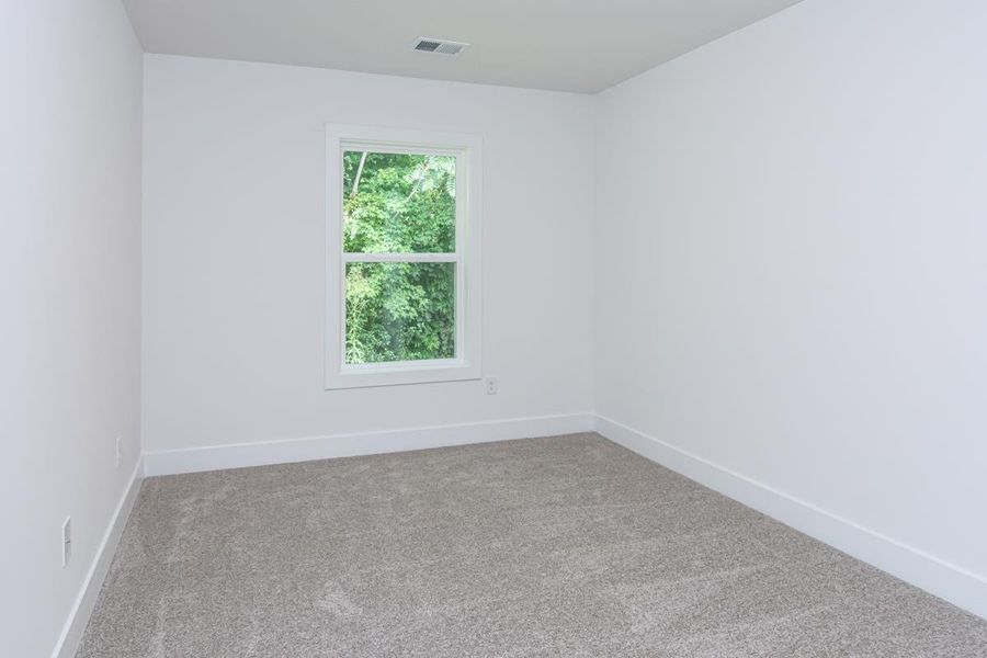 Representative unfurnished interior of a home built from the 1692 Townhome by Adams Homes in Parkstone Place Townhomes, Roebuck (Image 22).