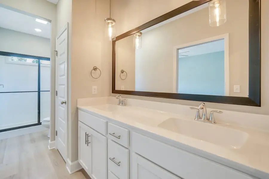 Sherwood – Primary Vanity with Pendant Lights and Linen Closet