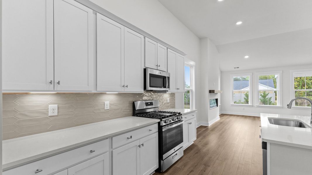 Furnished interior view inside a new home in Bluffs at Sun Colony, Longs (Image 9).