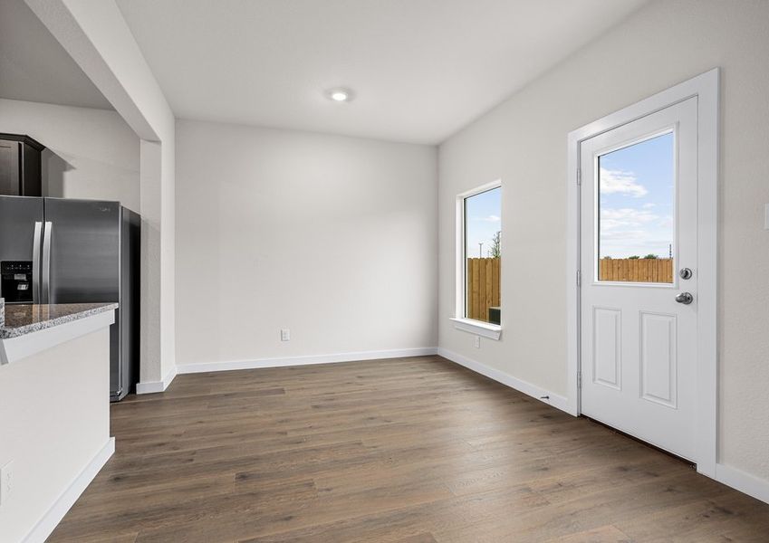 The dinig room sits right off of the kitchen.