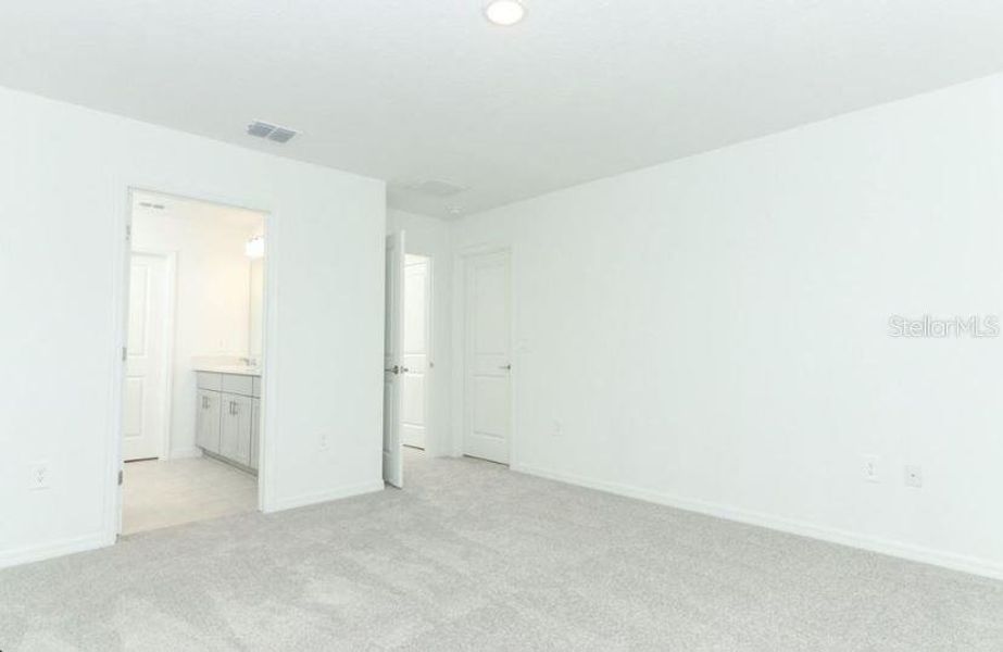 Spacious, unfurnished interior of a new home in Waterstone, Groveland (Image 22). Spacious, unfurnished interior of a new home in Waterstone, Groveland (Image 22).