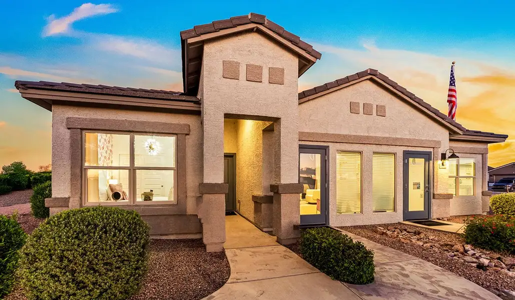 Front exterior of a new home in Barnett Village, Marana, AZ, highlighting curb appeal (Image 2).