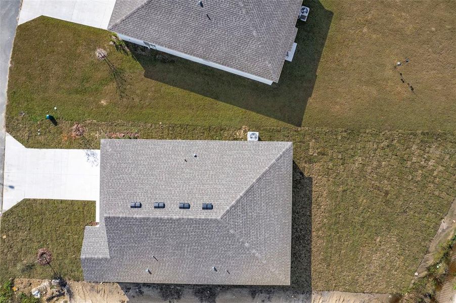 Exterior details and patio area of a home in West Oak, Ocala (Image 9).