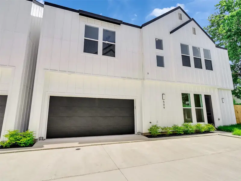 Front exterior of a new home in , Houston, TX, highlighting curb appeal (Image 29).