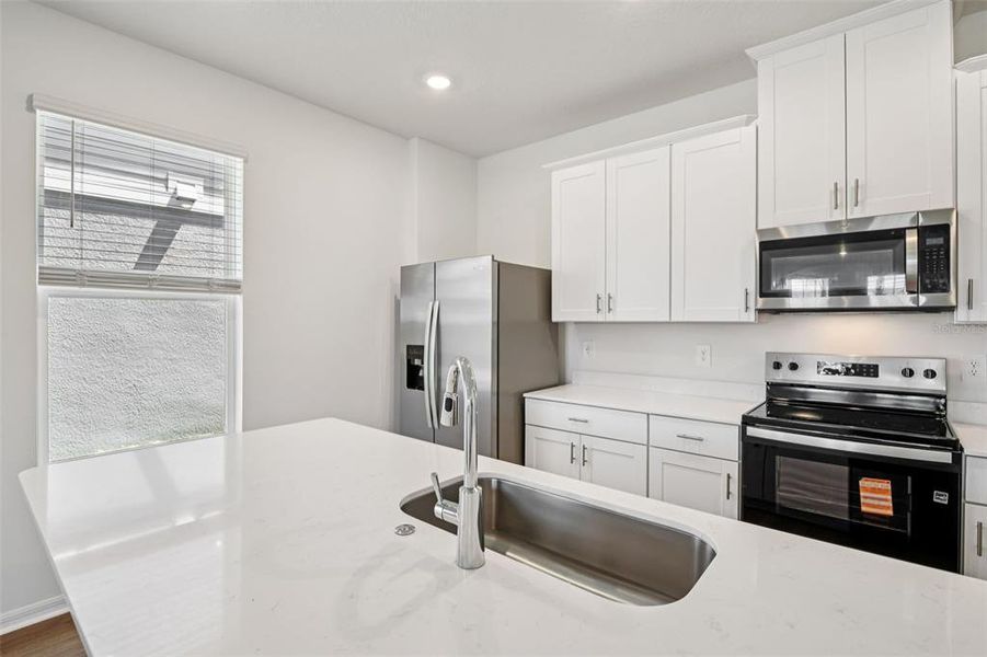 Furnished interior view inside a new home in The Meadow at Crossprairie Bungalows, St. Cloud (Image 7).