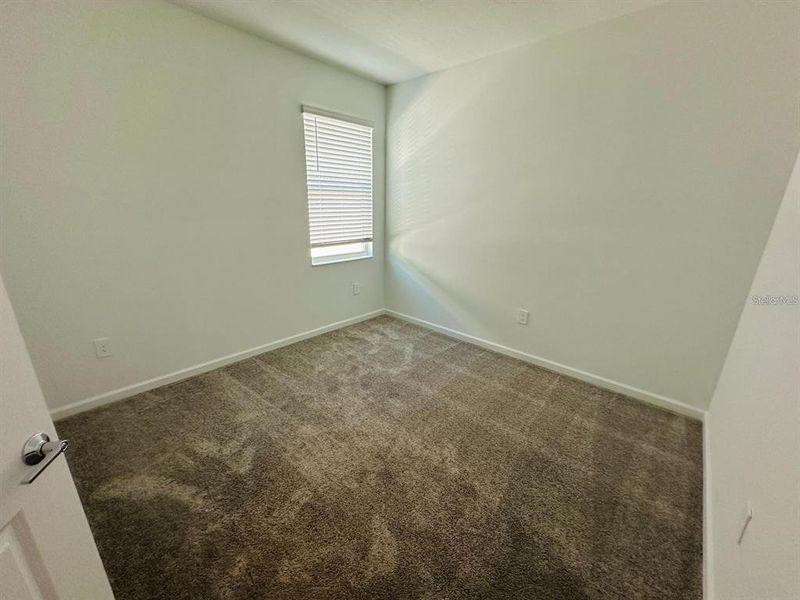 Spacious, unfurnished interior of a new home in Wellness Ridge: Estates Collection, Clermont (Image 18).