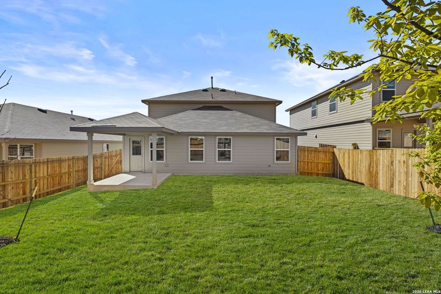 Exterior details and patio area of a home in Redbird Ranch, San Antonio (Image 2).