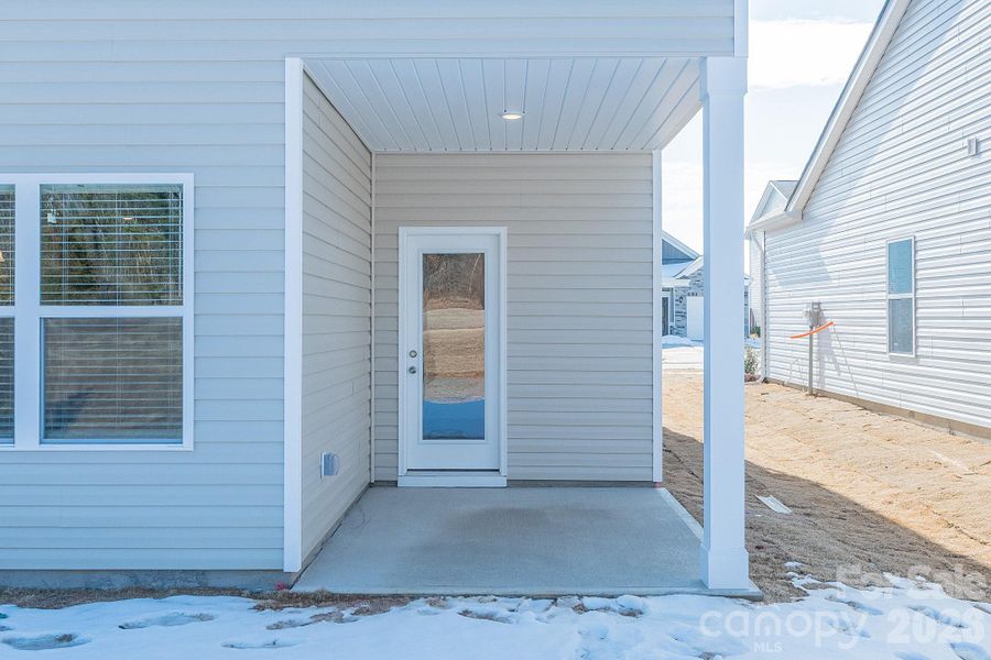 Exterior details and patio area of a home in Country Club Village, Salisbury (Image 4).