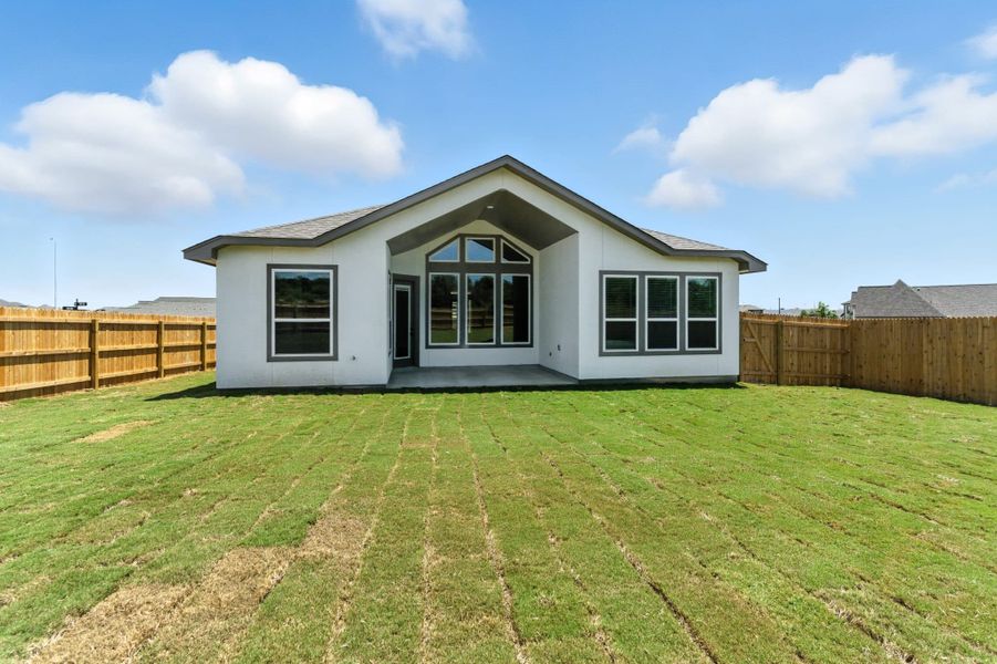 Exterior details and patio area of a home in Alsatian Oaks, Castroville (Image 3).